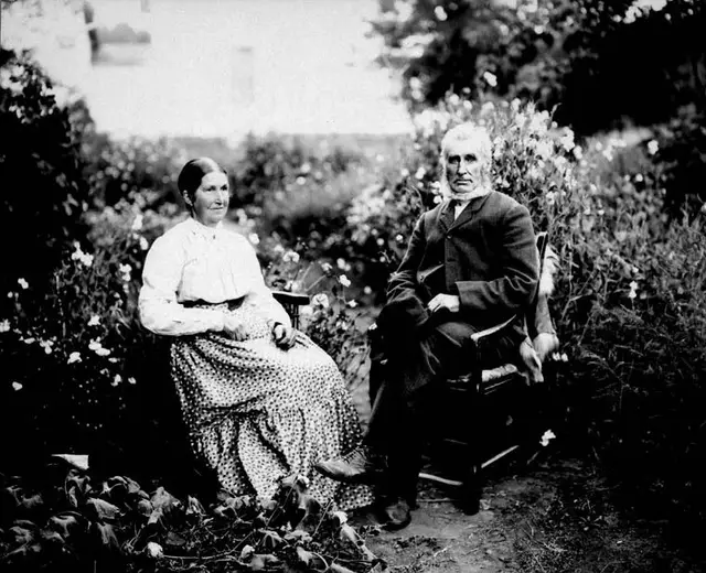 Settlers Mr. and Mrs. Hall in their garden
